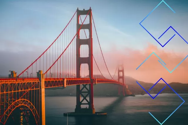 California Car Shipping Across the Golden Gate Golden Gate Bridge at sunset, symbolizing the gateway for California car shipping and vehicle transport services.